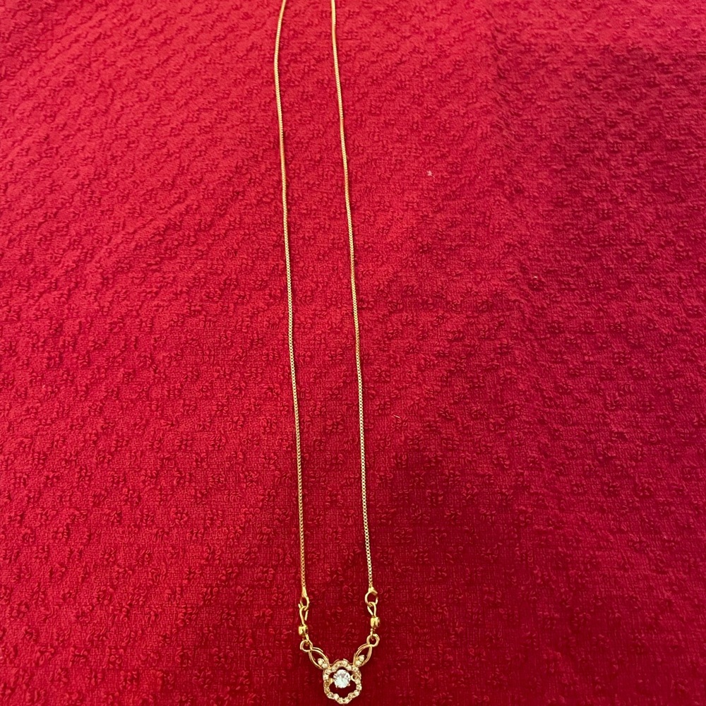 Elegant Gold Necklace with Crystal Pendant